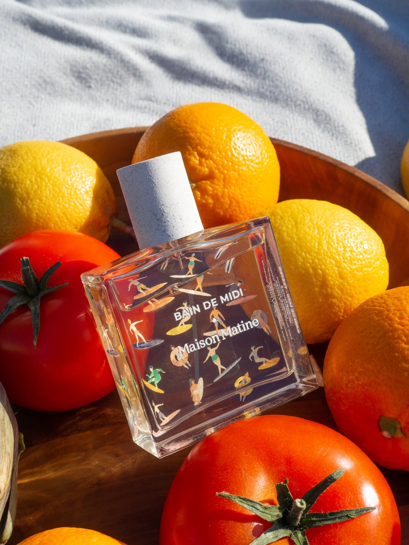 BAIN DU MIDI A soft and playful creation, Bain de Midi brings you a feeling of sunshine all year long!